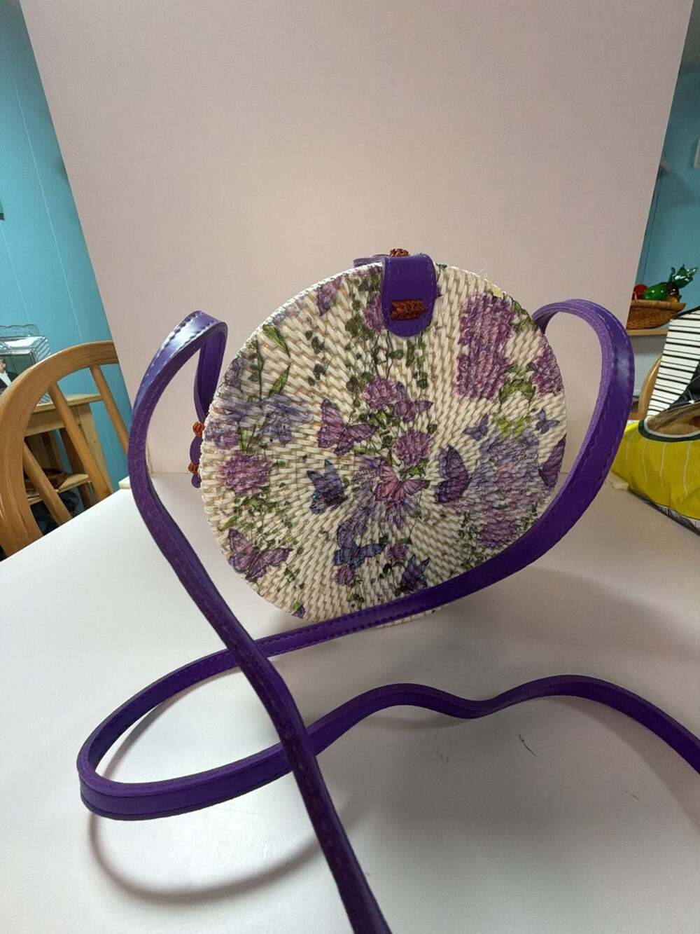 Handwoven Round Bali Rattan Crossbody Bag with Purple Butterfly Floral Decoupage - Picture 1 of 4